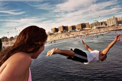 Lara Wechsler flying water summer jump blue